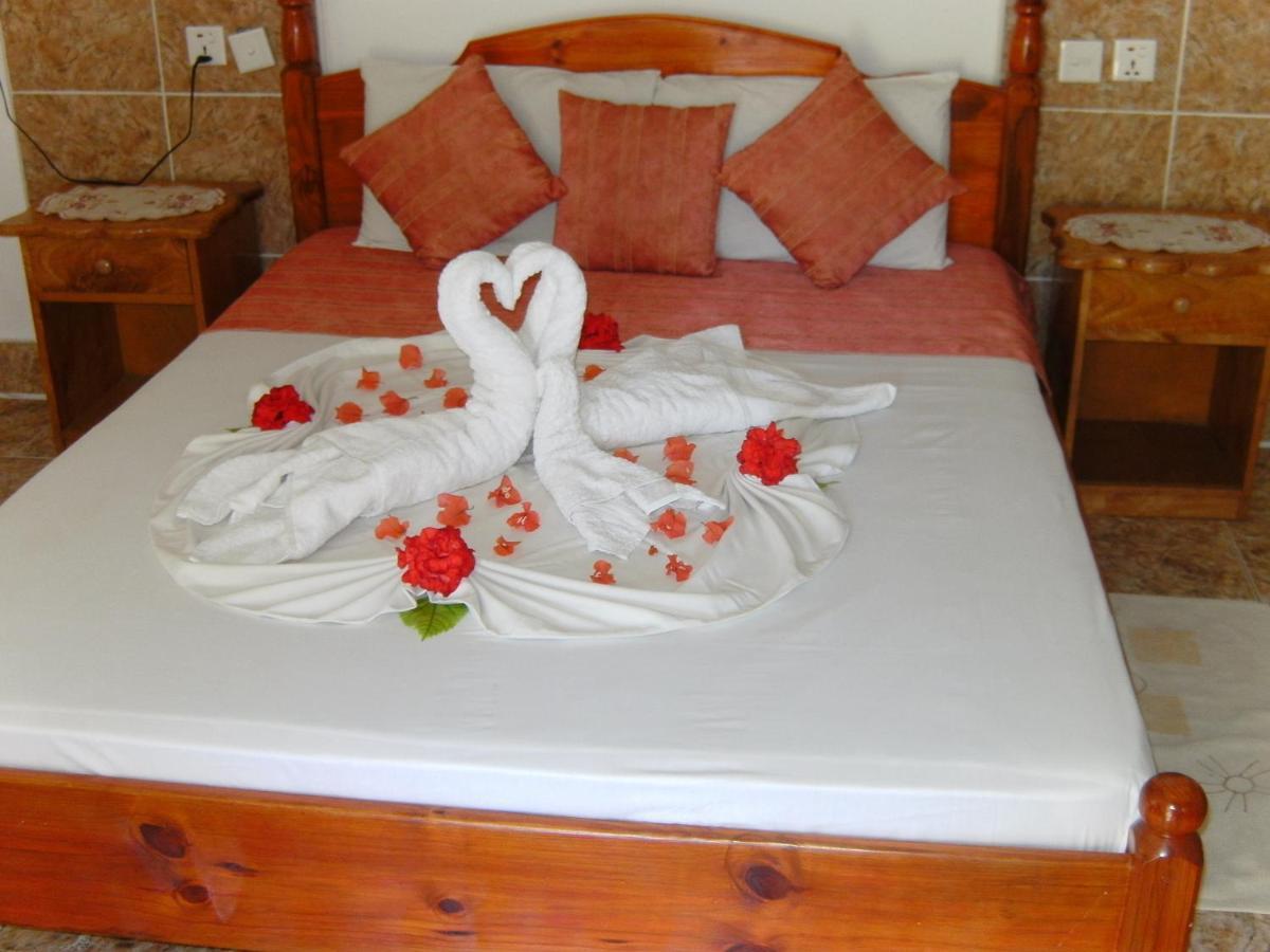 Rising Sun Guesthouse La Digue Rom bilde