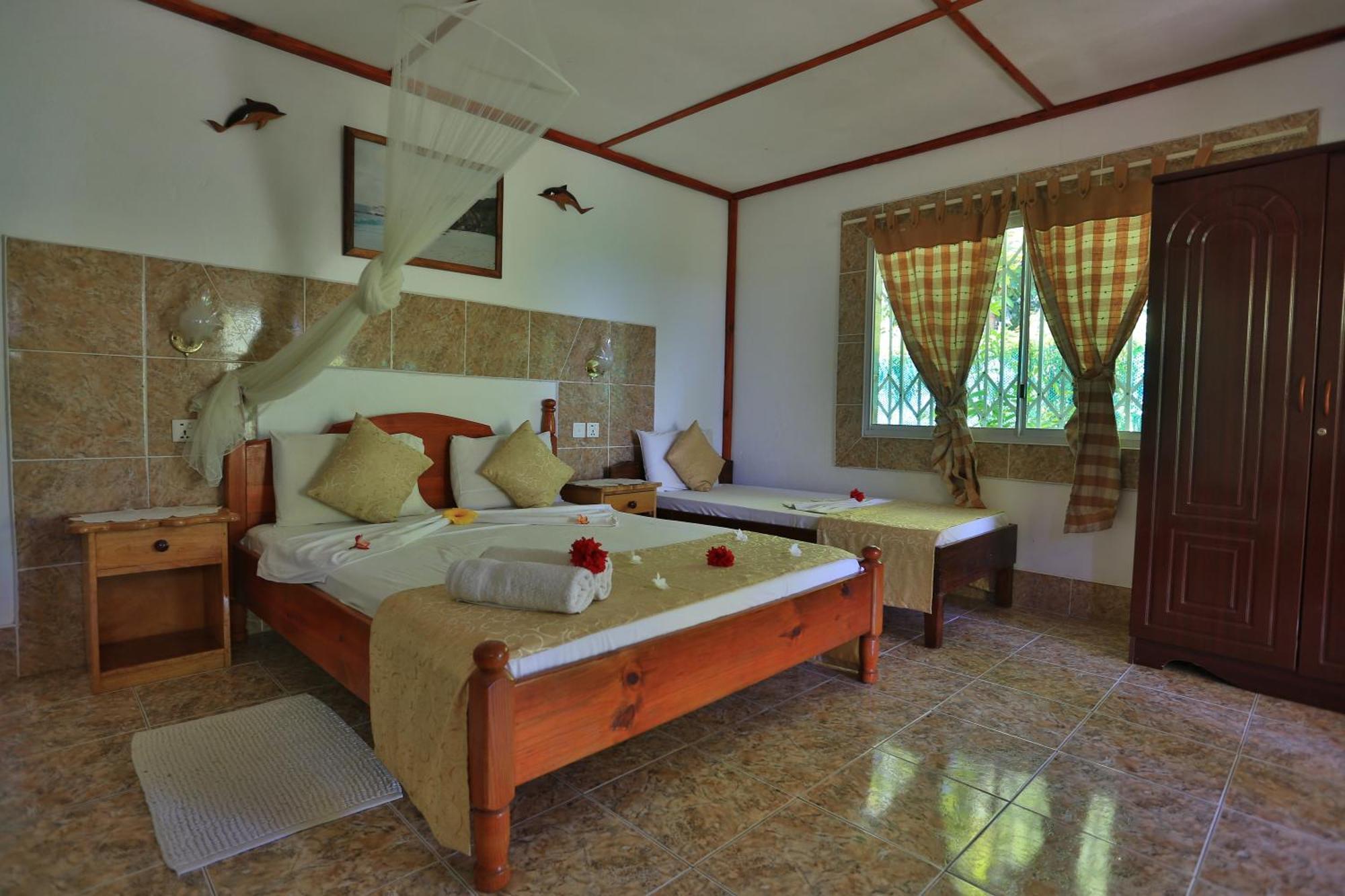 Rising Sun Guesthouse La Digue Rom bilde